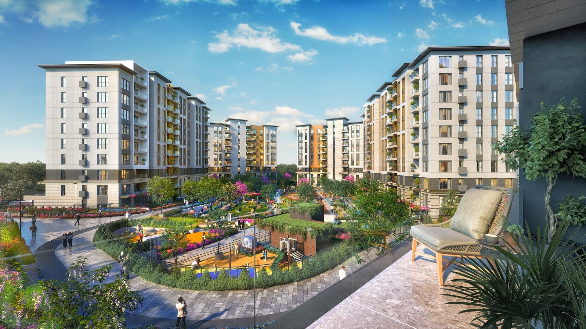 Rendering of the blocks and the courtyard garden seen from a balcony with a lounge chair and plants