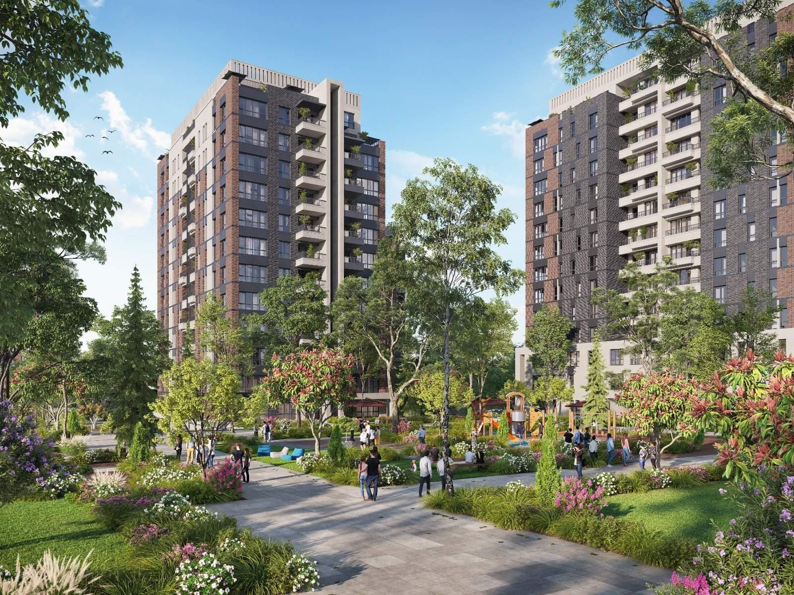 Garden path winding through trees and flowering shrubs between the residential blocks
