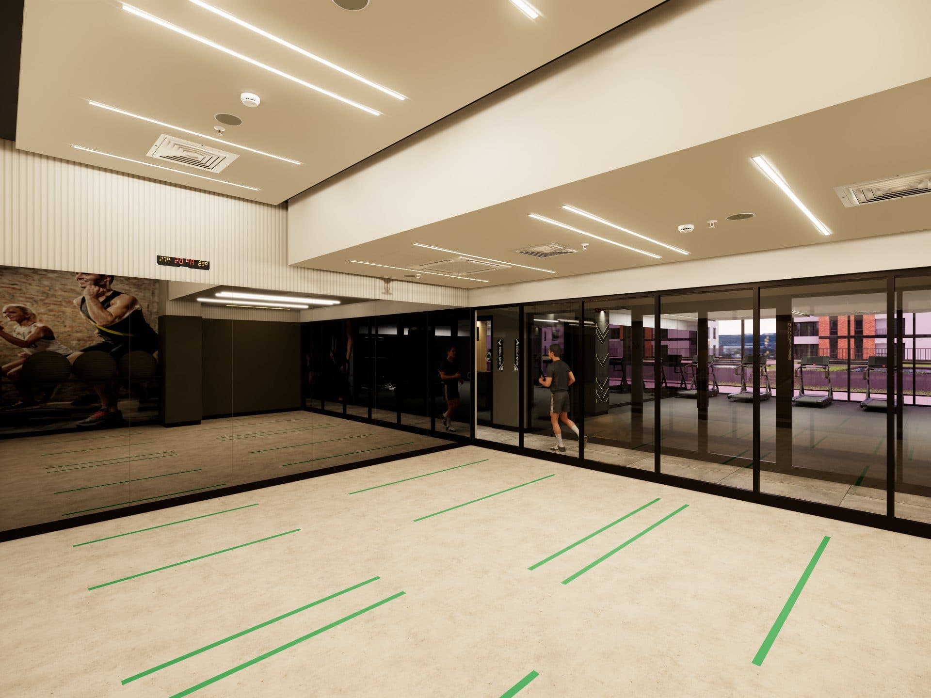 Exercise studio with mirrored walls next to the gym with treadmills in the club house