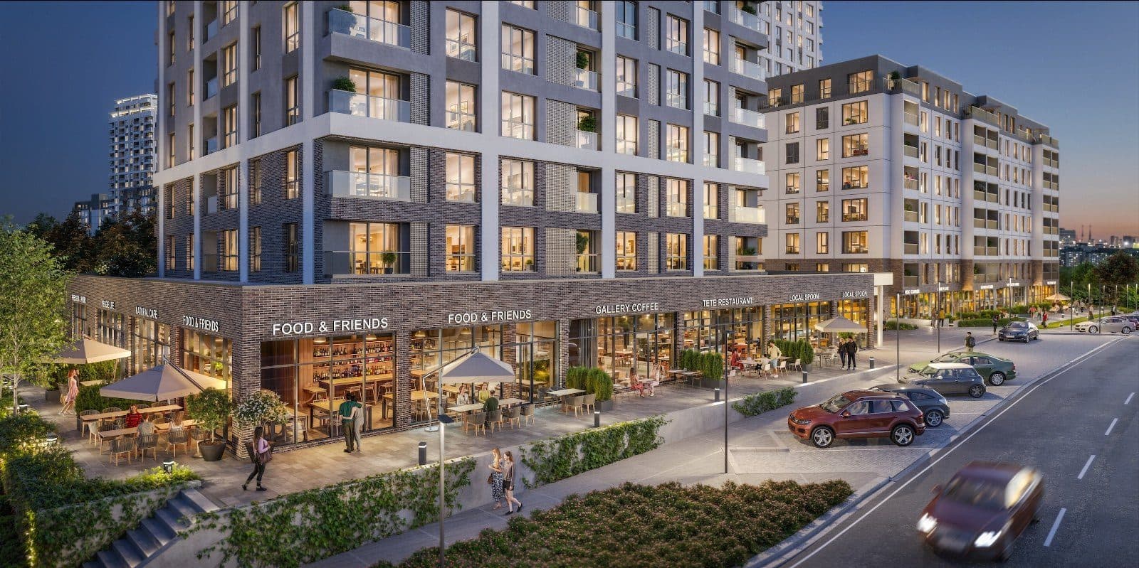 Street-level cafes and shops under a residential block at dusk
