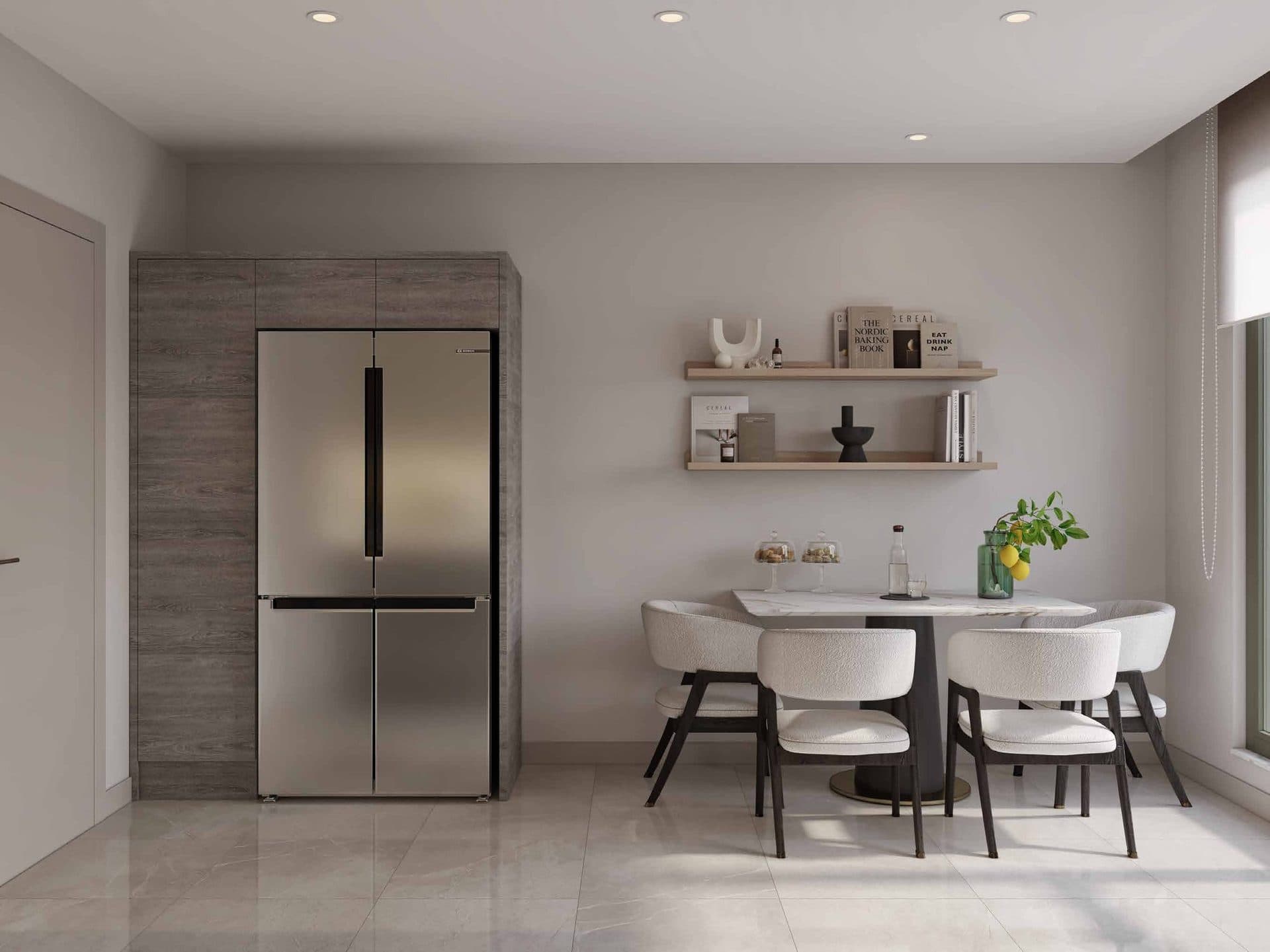 Dining corner with a tall fridge and wall shelves in a 3+1 apartment