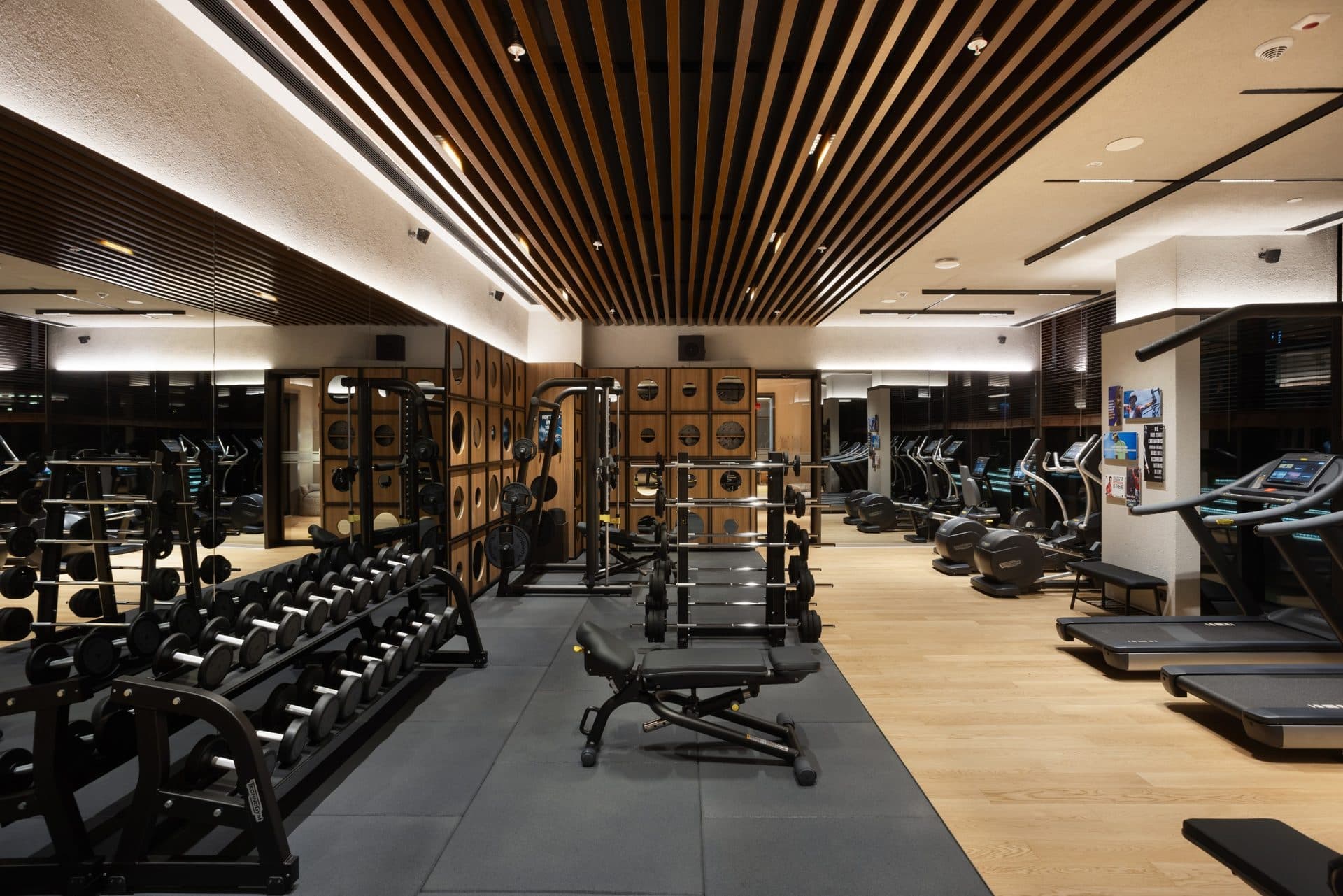 Fitness center with free weights, training racks, treadmills and cross trainers