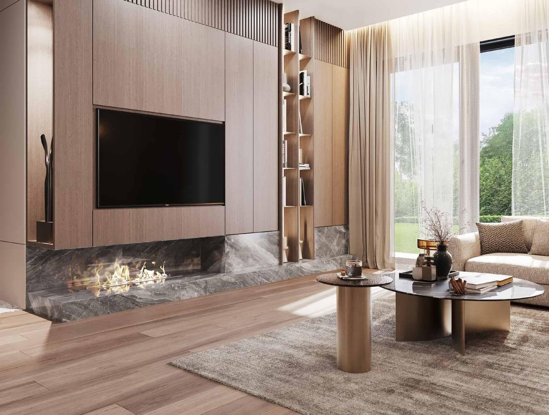 Living room with a fireplace, a TV wall and a large window onto the garden