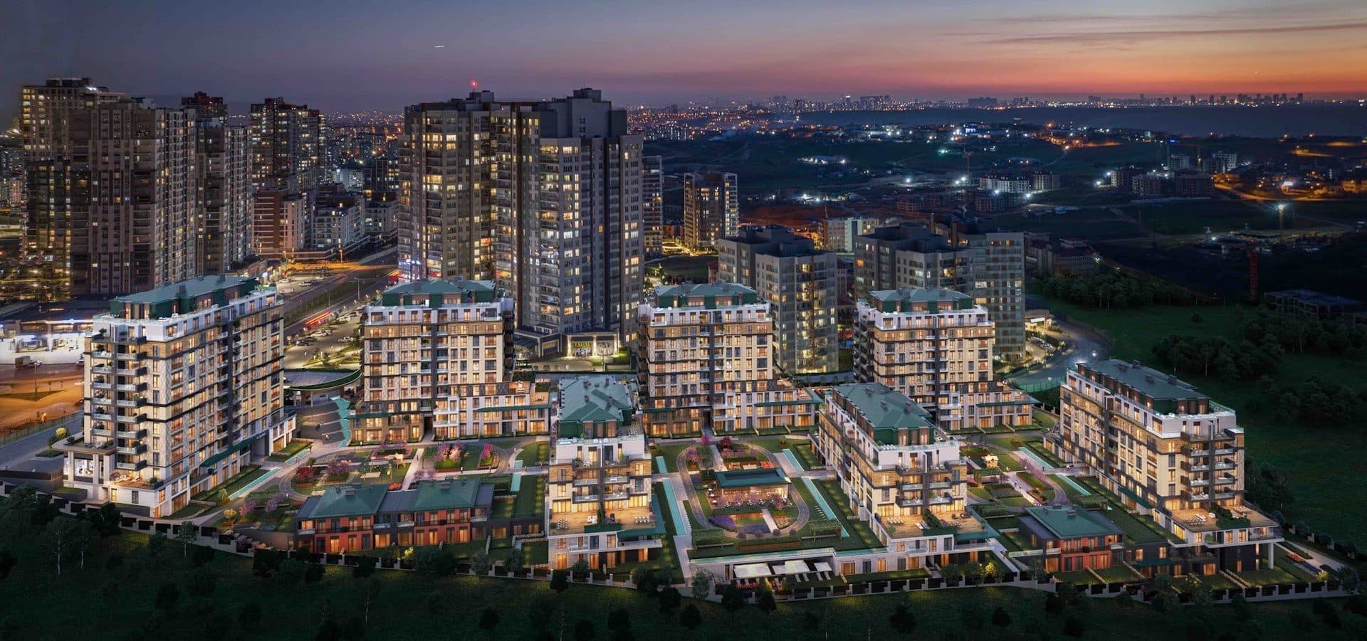 Night aerial rendering of the lit blocks and gardens with the Kayasehir skyline behind