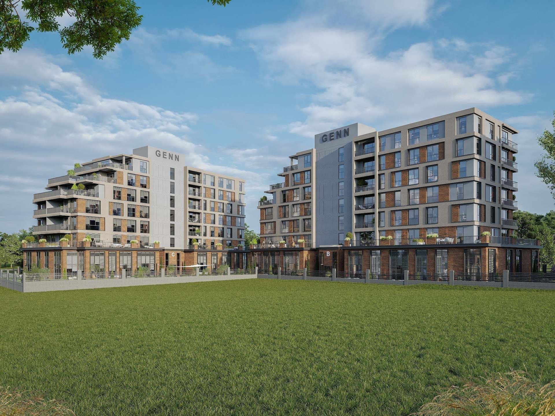 Rendering of the B and C blocks behind a fenced lawn, with brick-clad ground floors and the GENN name on the stair towers
