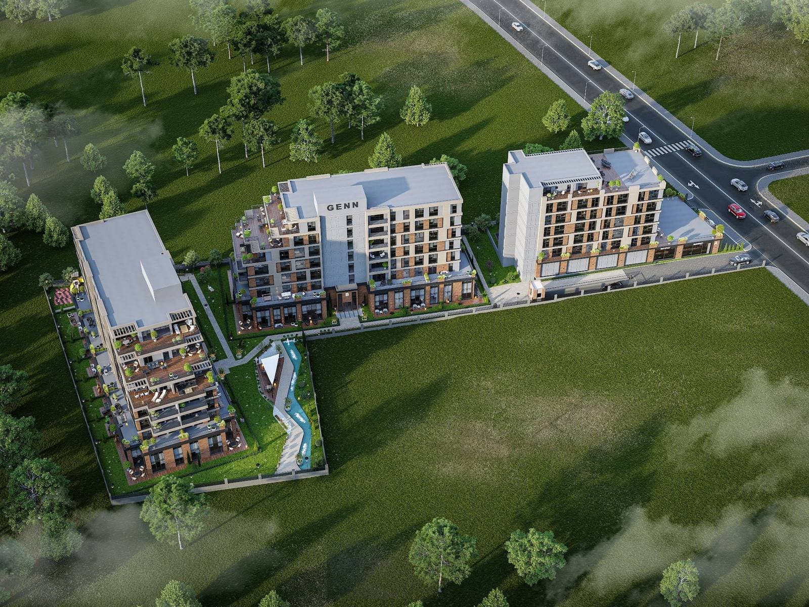 Aerial rendering of the long, narrow site with its three blocks, a landscaped courtyard with a water channel and the road junction at the front