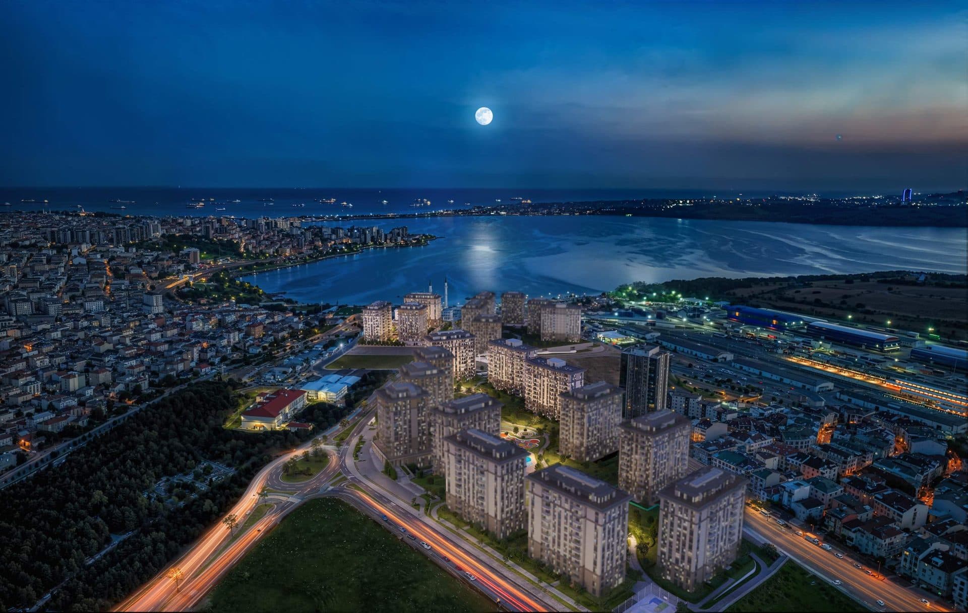 Aerial night view of Hayat Flora with Lake Kucukcekmece and the Sea of Marmara behind