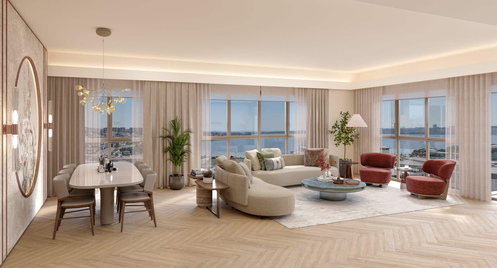 Living and dining room with large windows facing the water