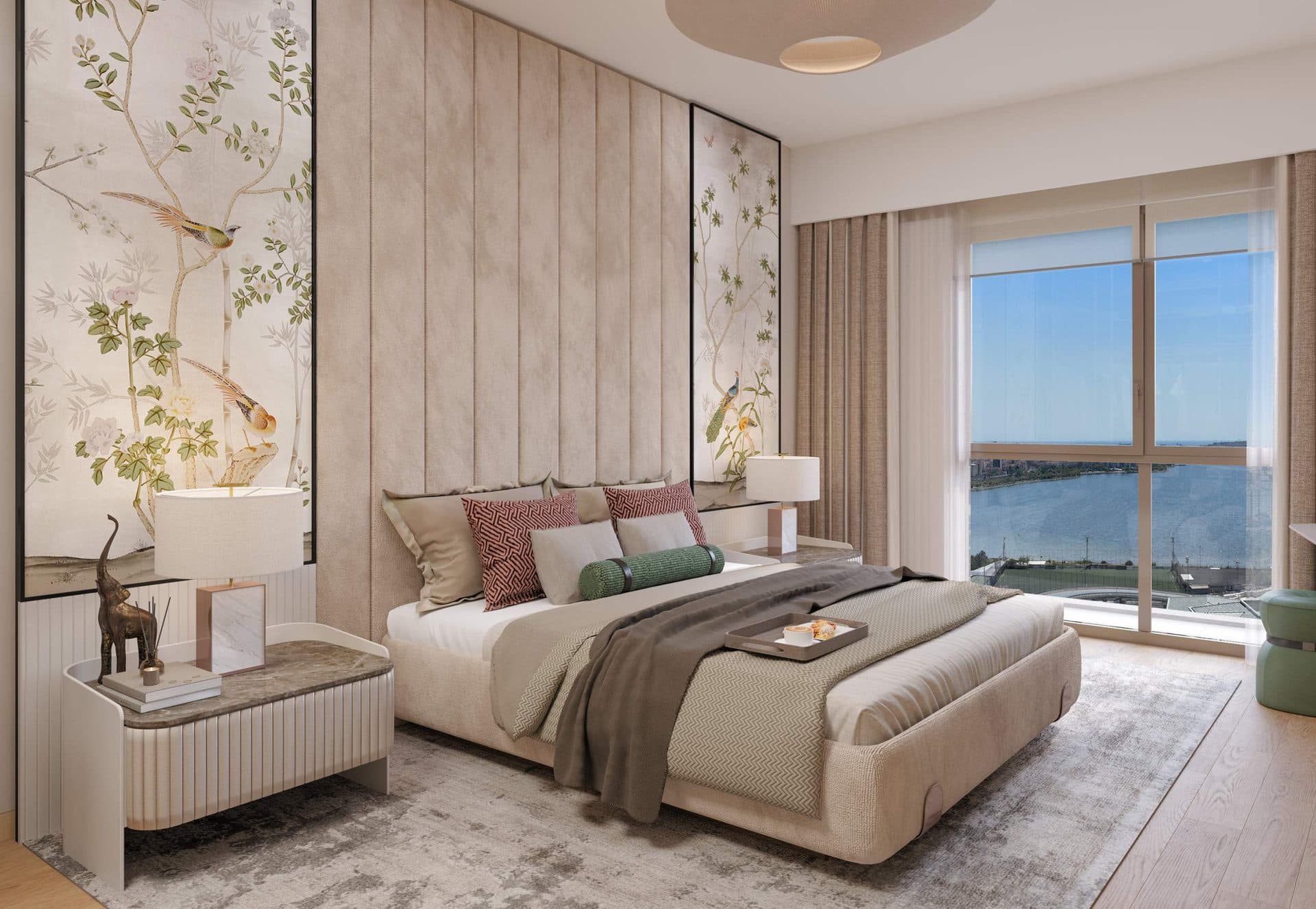 Master bedroom with a window facing the water