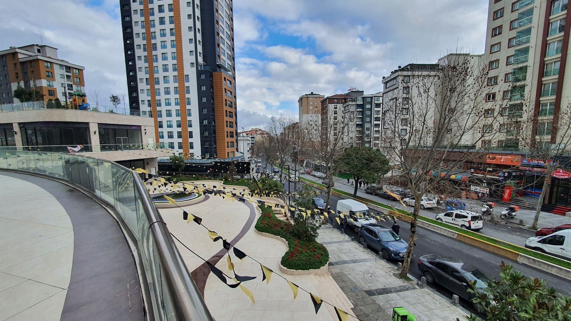 Upper terrace overlooking landscaped steps down to Maslak Caddesi