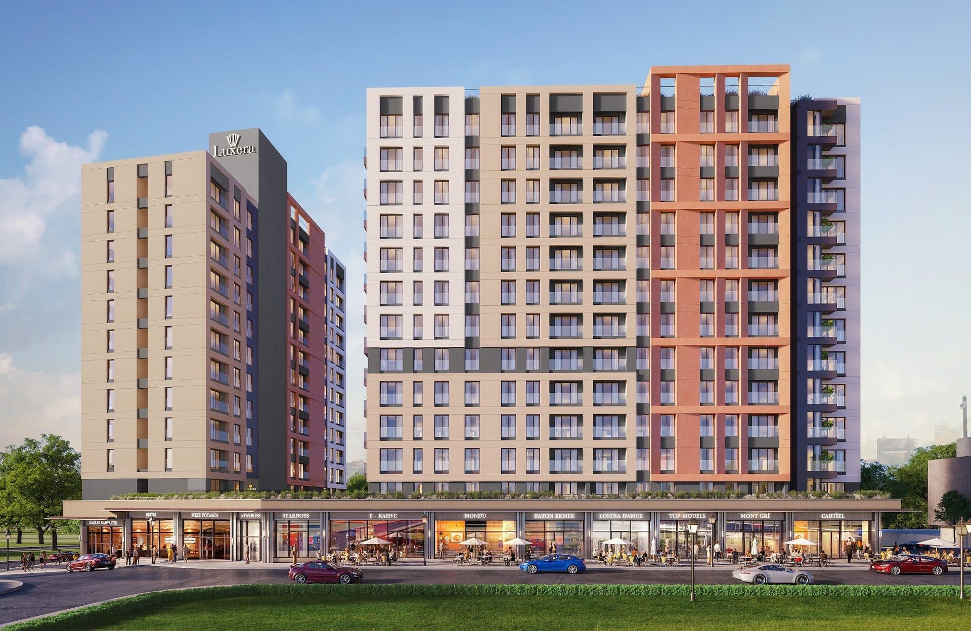 Rendering of the long street front, with shops and cafe terraces along the ground floor and the two blocks rising above them