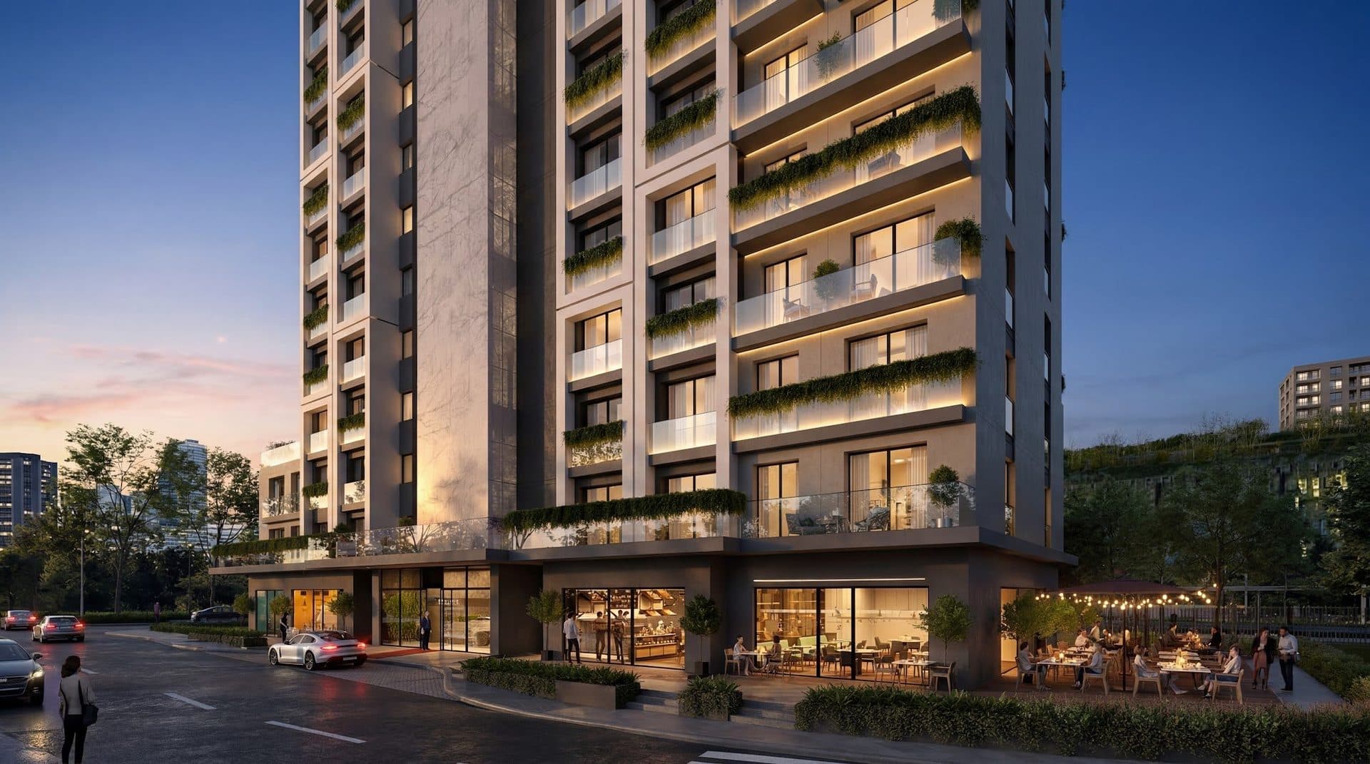 Street-level rendering of the lower floors at dusk, with green balcony planters and cafes and restaurants with outdoor tables at the base