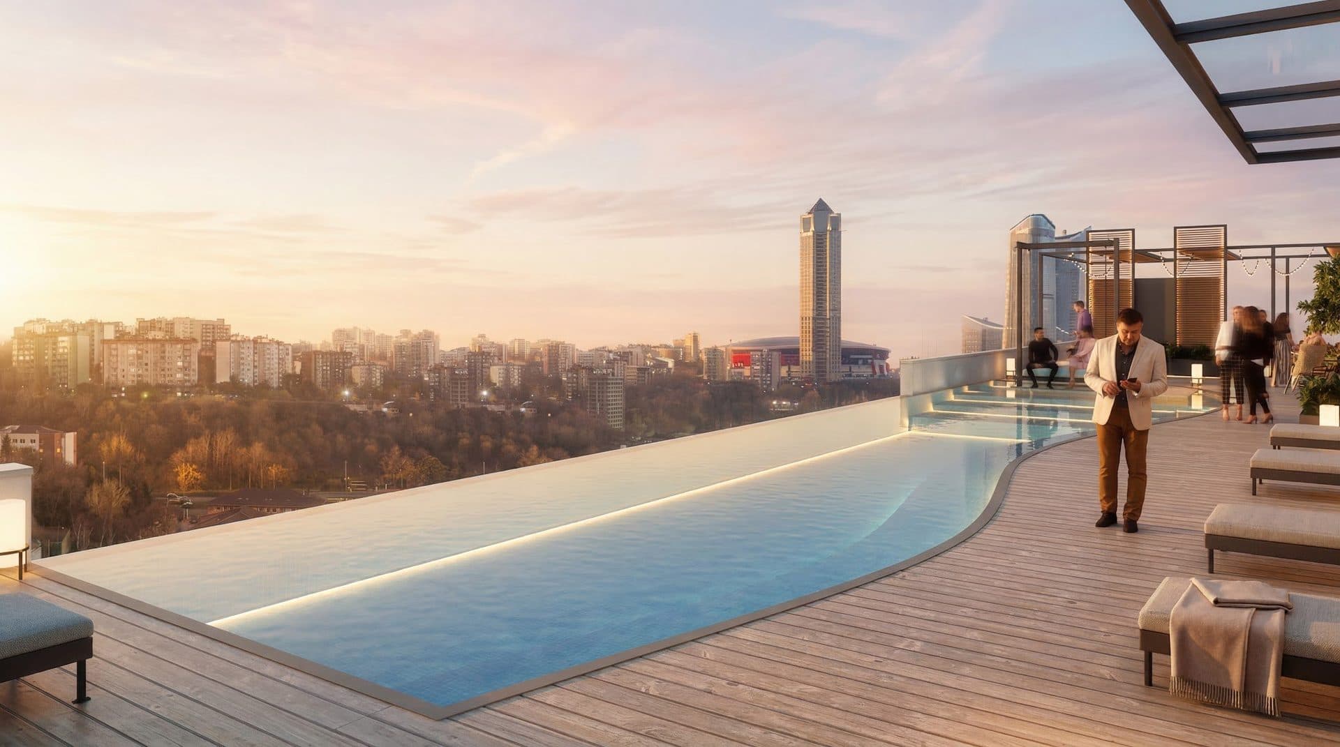 Rendering of the rooftop infinity pool on a wooden deck at sunset, with sun loungers and a view over wooded slopes and the city