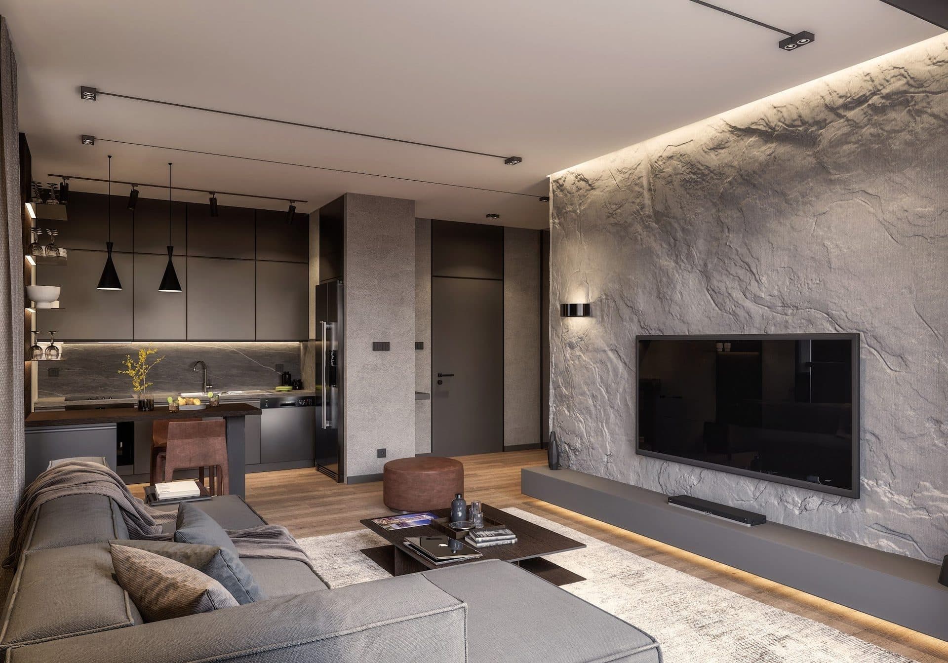 Rendering of an open-plan living room and dark kitchen with pendant lights, a dining counter and a wall-mounted TV
