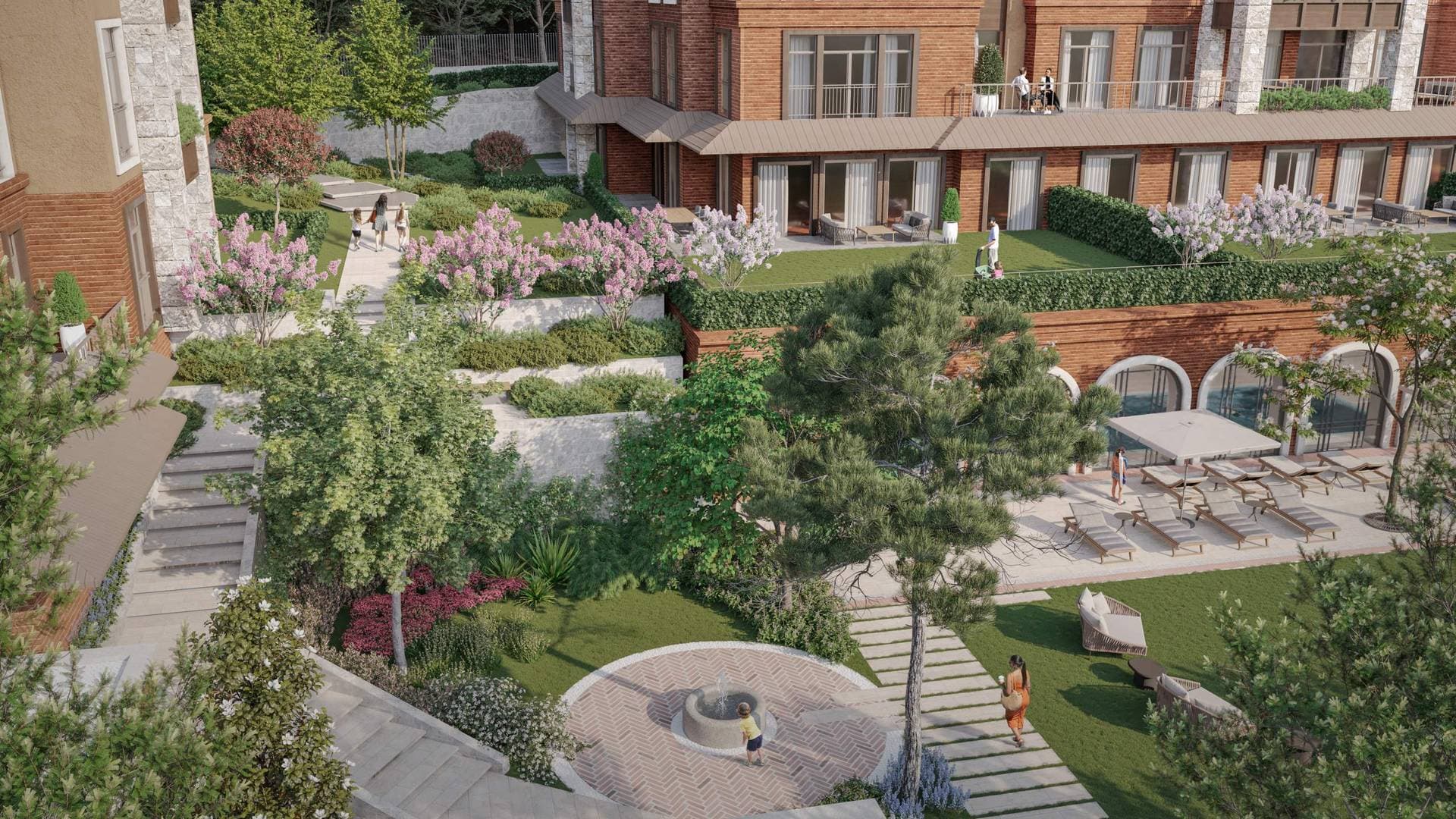 Landscaped gardens and terraces seen from above, with sun loungers by the arched facade
