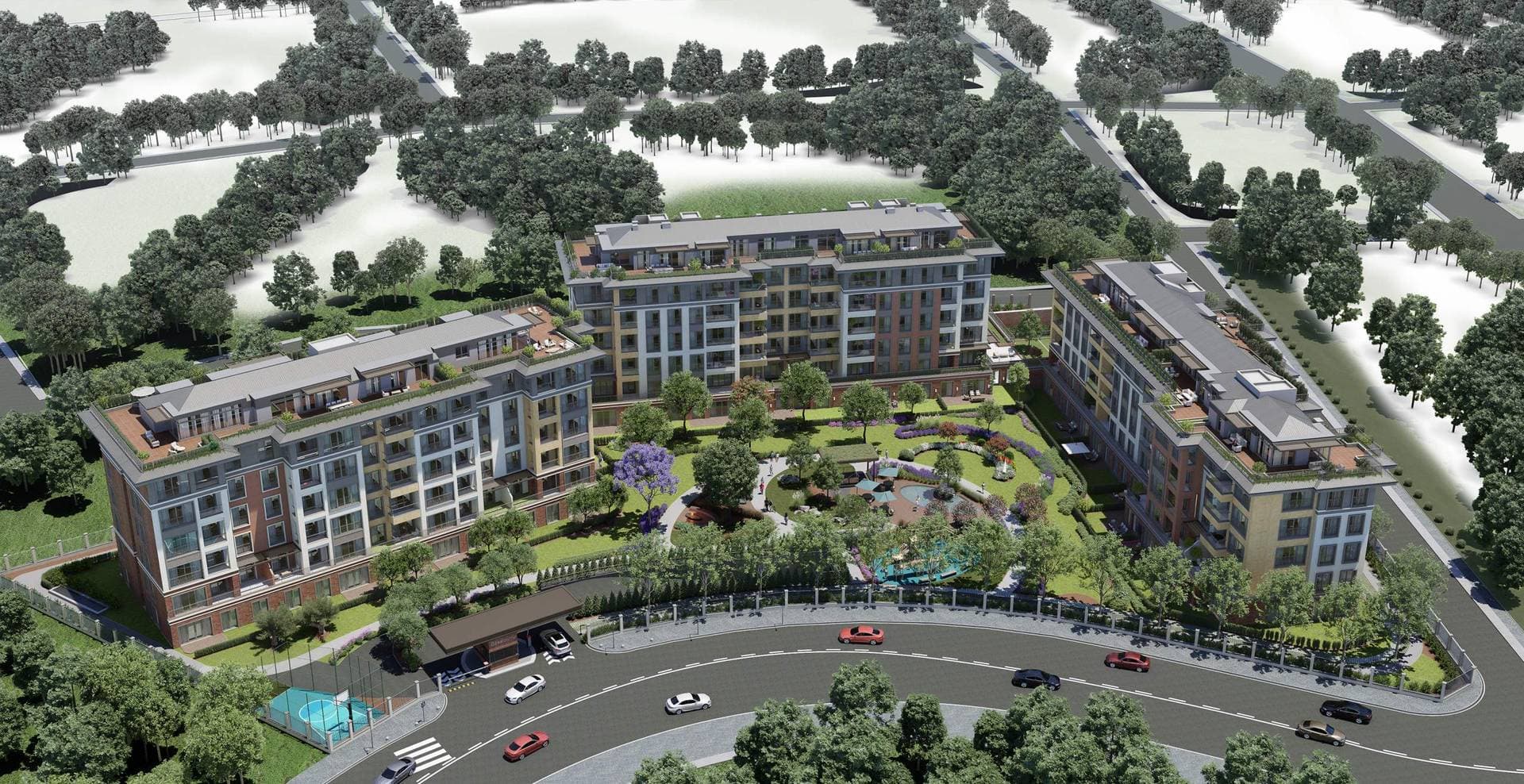 Aerial view of the whole complex: three buildings around the central garden, with the entrance and road in front
