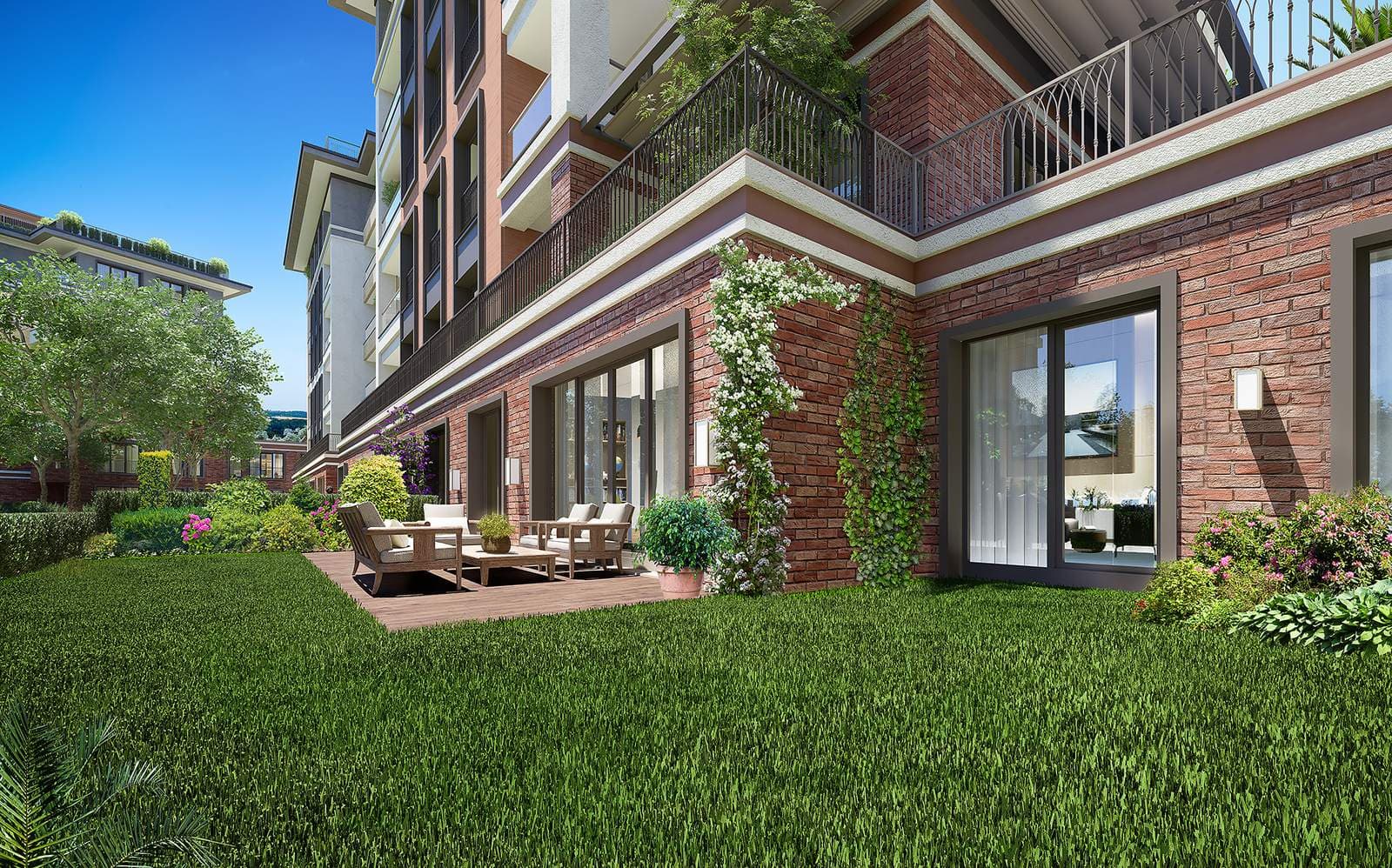 Private garden of a ground-floor apartment with a lawn and outdoor sofa