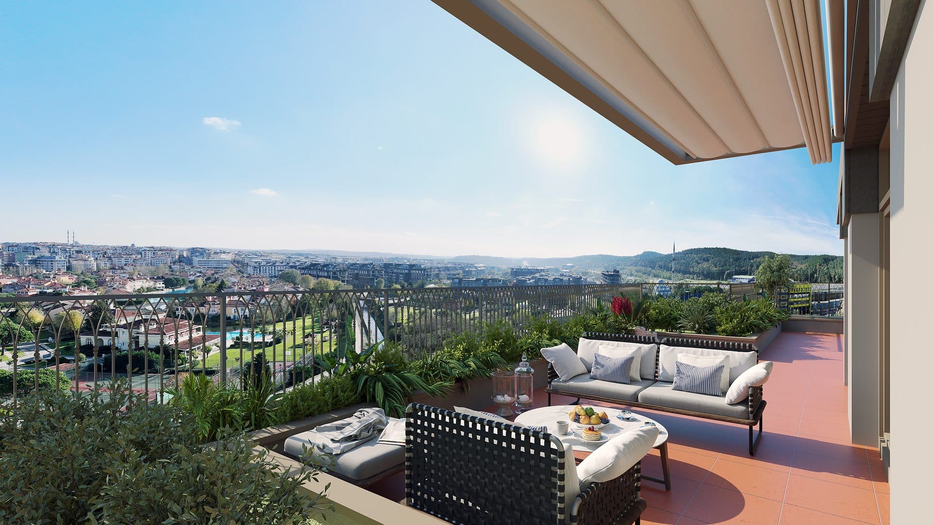 Roof terrace with outdoor sofas and a wide view over the city