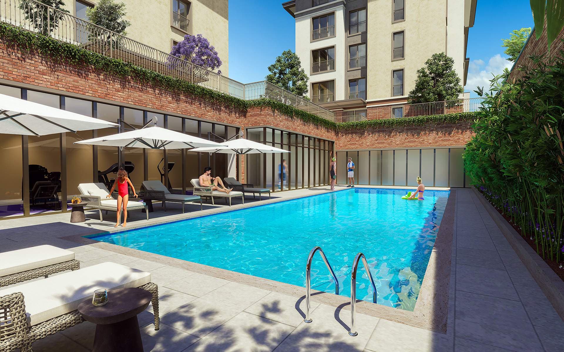 Outdoor swimming pool with sun loungers and umbrellas