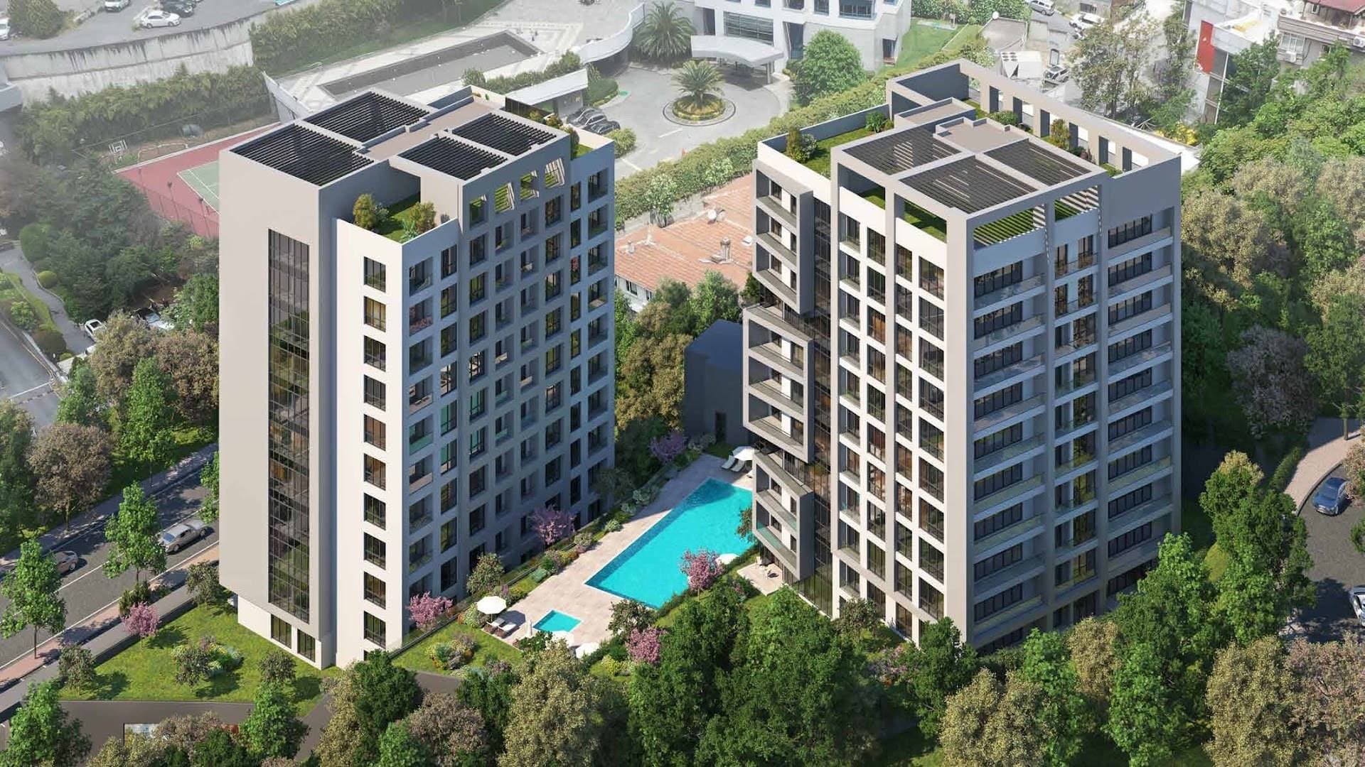 Aerial view of the two blocks with the outdoor swimming pool and gardens between them