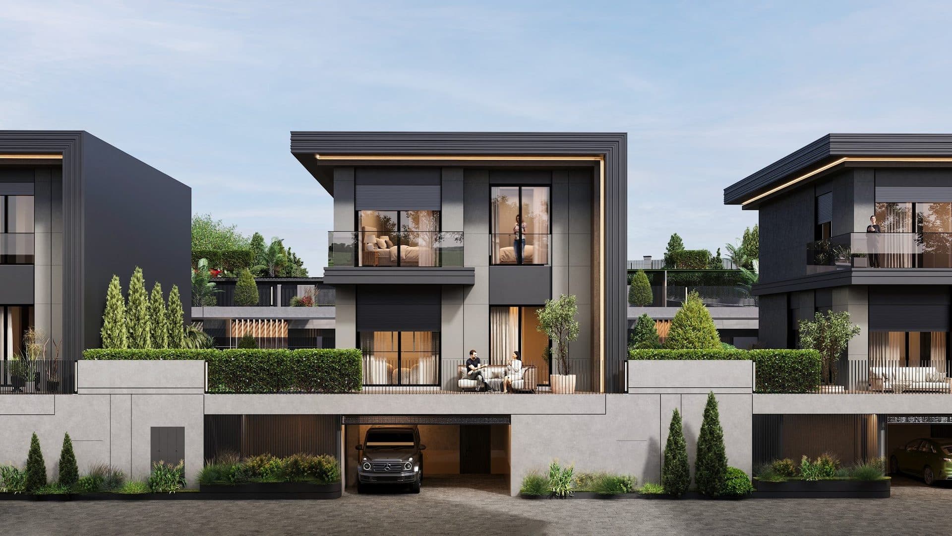 Front view of a villa with a garden terrace above a basement garage, between two neighboring villas