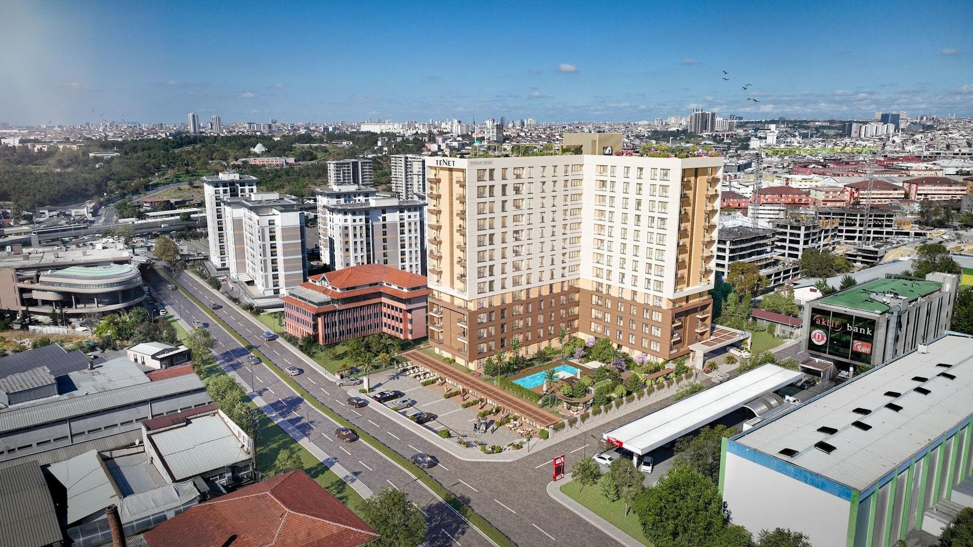 Aerial rendering of the building among the surrounding streets and buildings of Topkapi, with the pool terrace set in the corner of the L