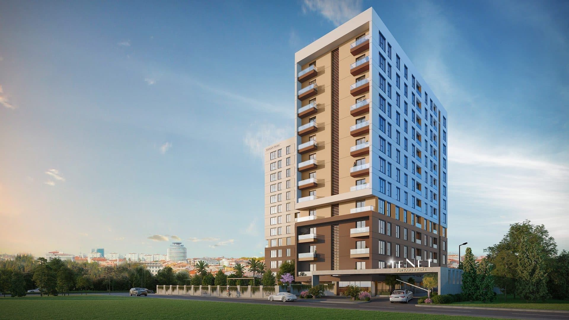 Rendering of the building in afternoon light, with the entrance canopy and project sign at street level