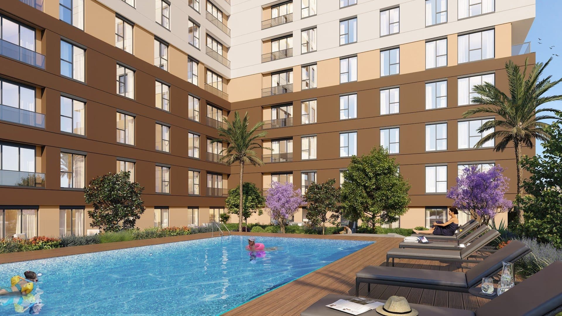 Rendering of the outdoor pool and flowering trees in the courtyard between the two wings