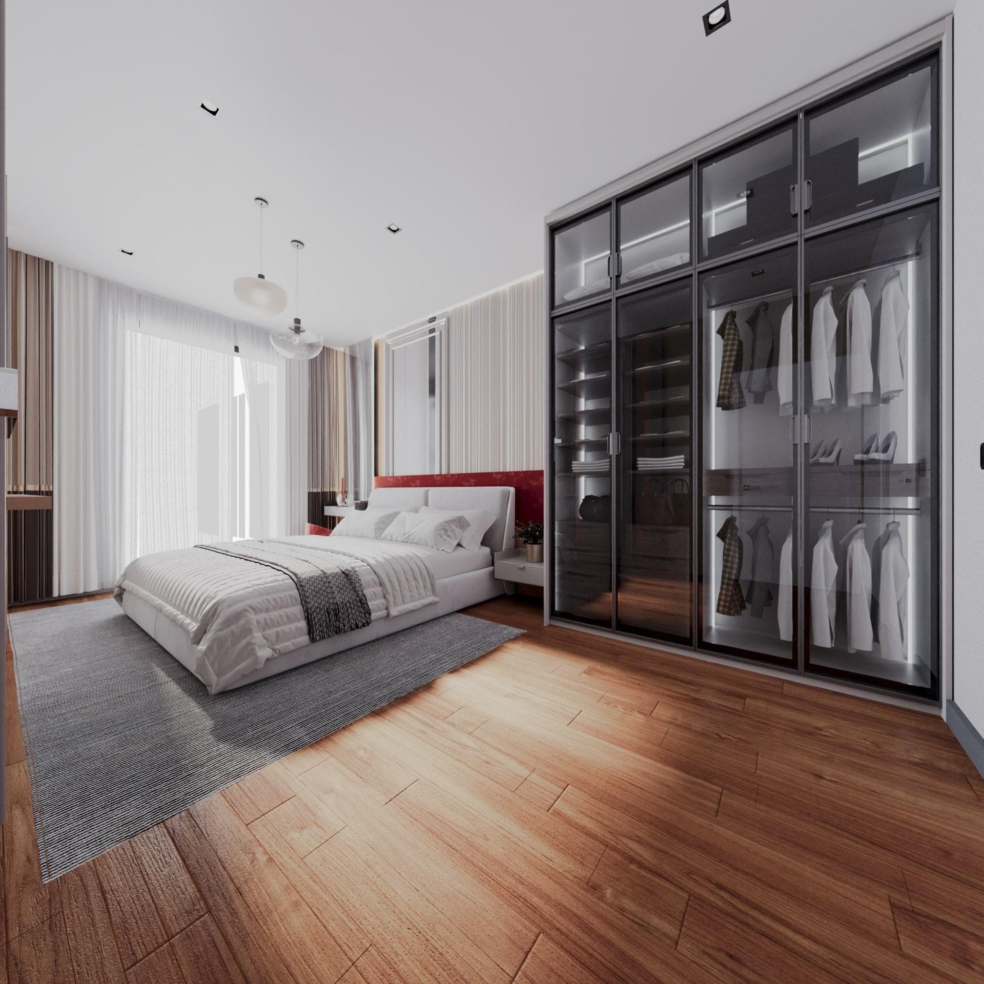 Master bedroom with a double bed and a glass-fronted wardrobe